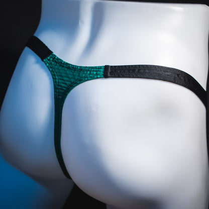 Men's green and black mesh thong underwear, classic cut, angled rear view.