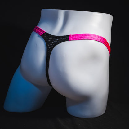 Men's bright pink and black mesh thong underwear, classic cut, full angled rear view.