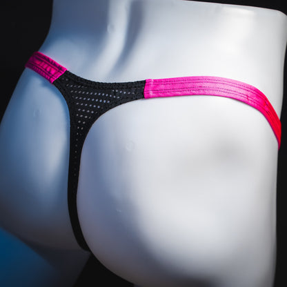 Men's bright pink and black mesh thong underwear, classic cut, angled rear view.