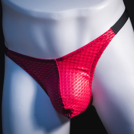 Men's pink athletic mesh thong underwear, classic cut, angled front view.