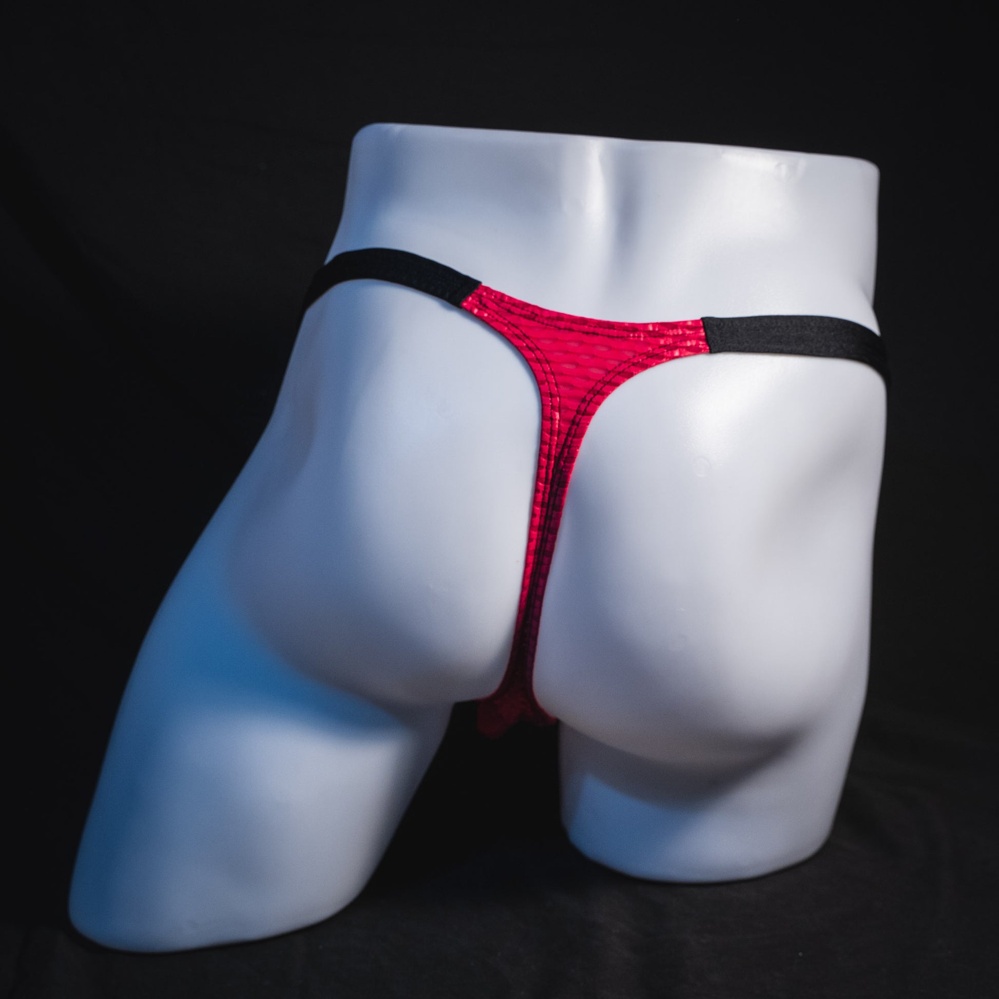 Men's pink athletic mesh thong underwear, classic cut, Full rear view