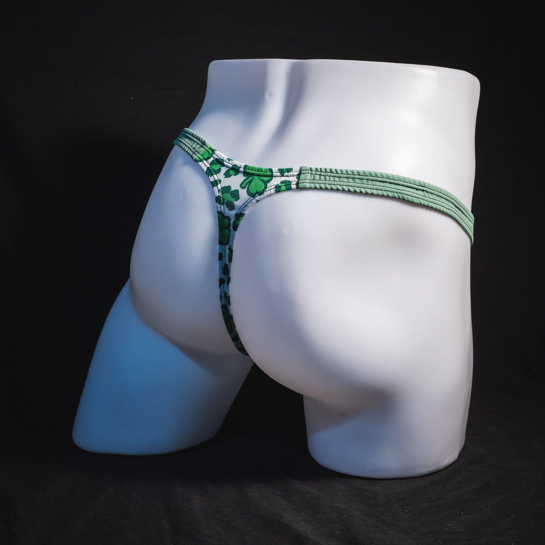 Men's St Patrick's day thong underwear, classic cut, Full angled rear view.