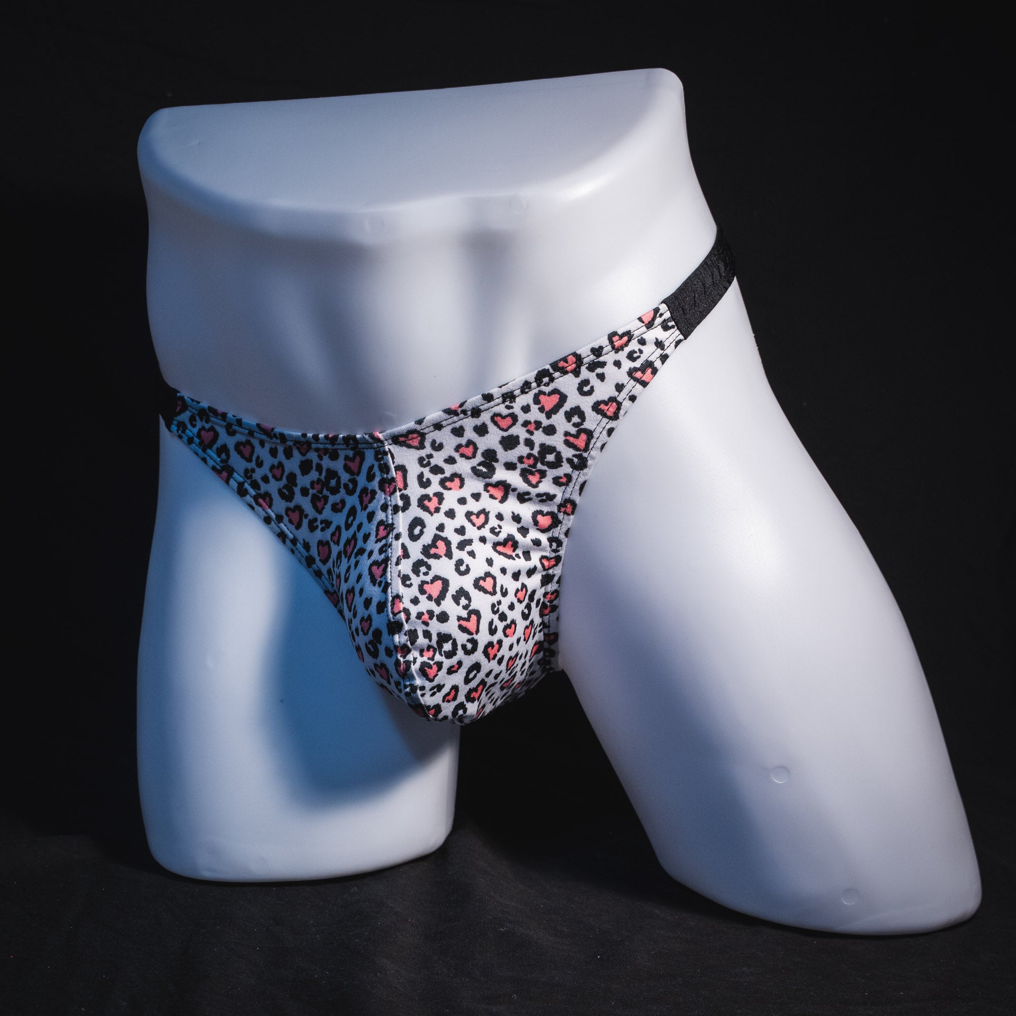 Men's white cheetah with pink hearts thong underwear, classic cut, Full front angled view