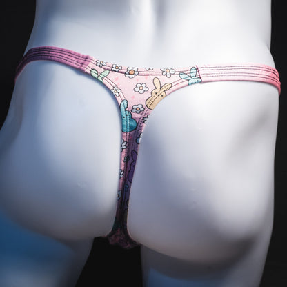 Men's pink easter bunnies thong underwear, classic cut, rear view.