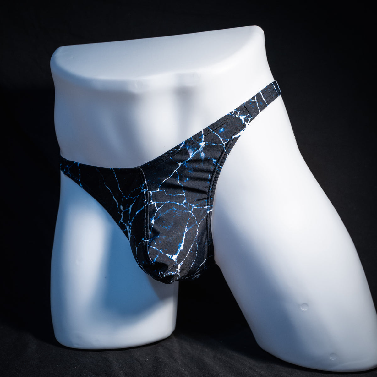 Men's ocean waves thong underwear, classic cut, front view.