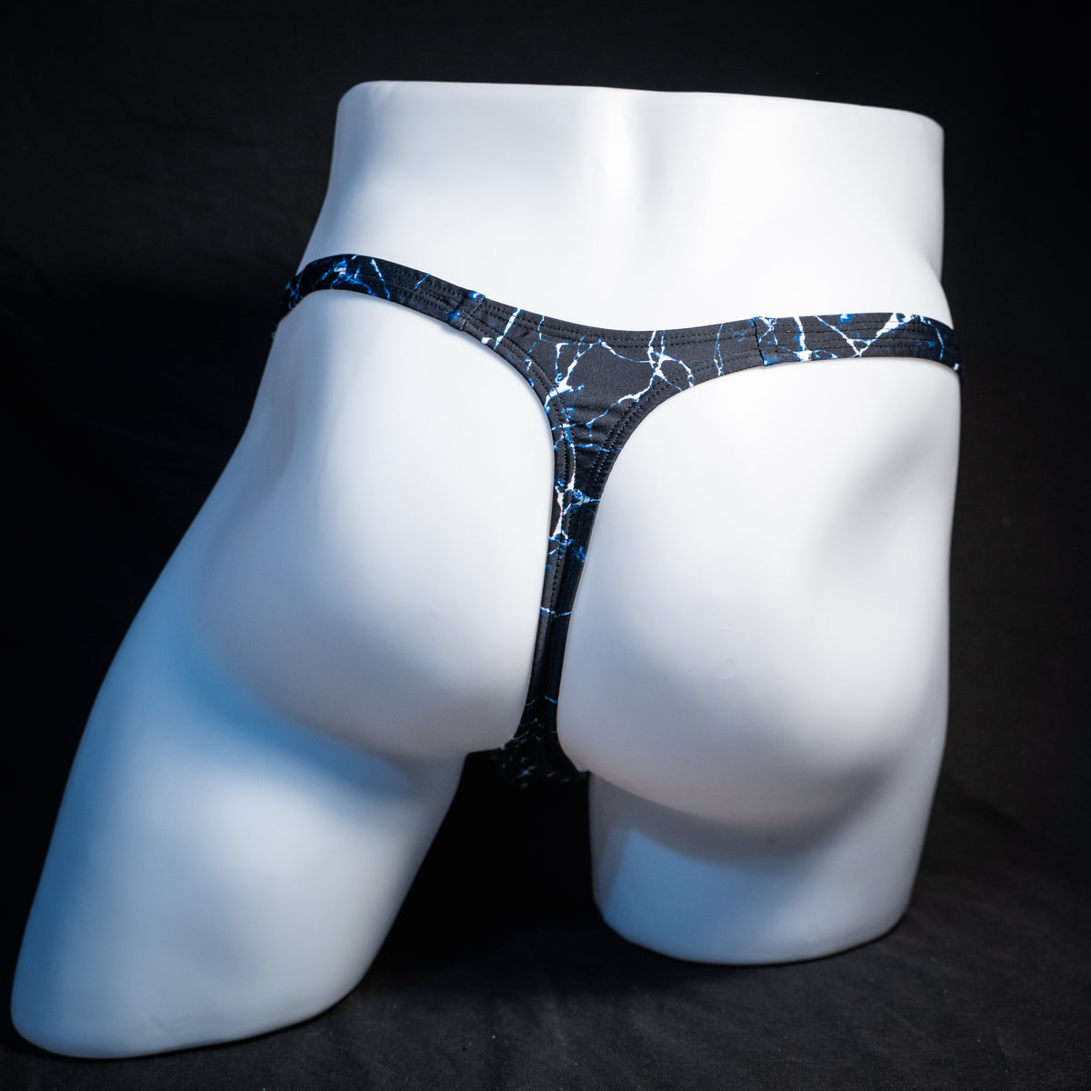 Men's ocean waves thong underwear, classic cut, rear view.