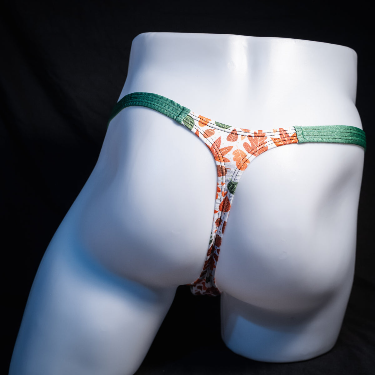 Men's autumn themed thong underwear, classic cut, rear view.