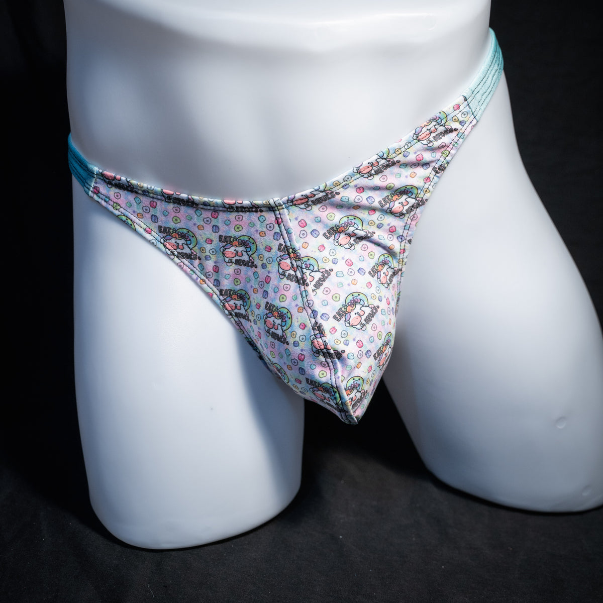 Men's bag of dicks thong underwear, classic cut, front view.