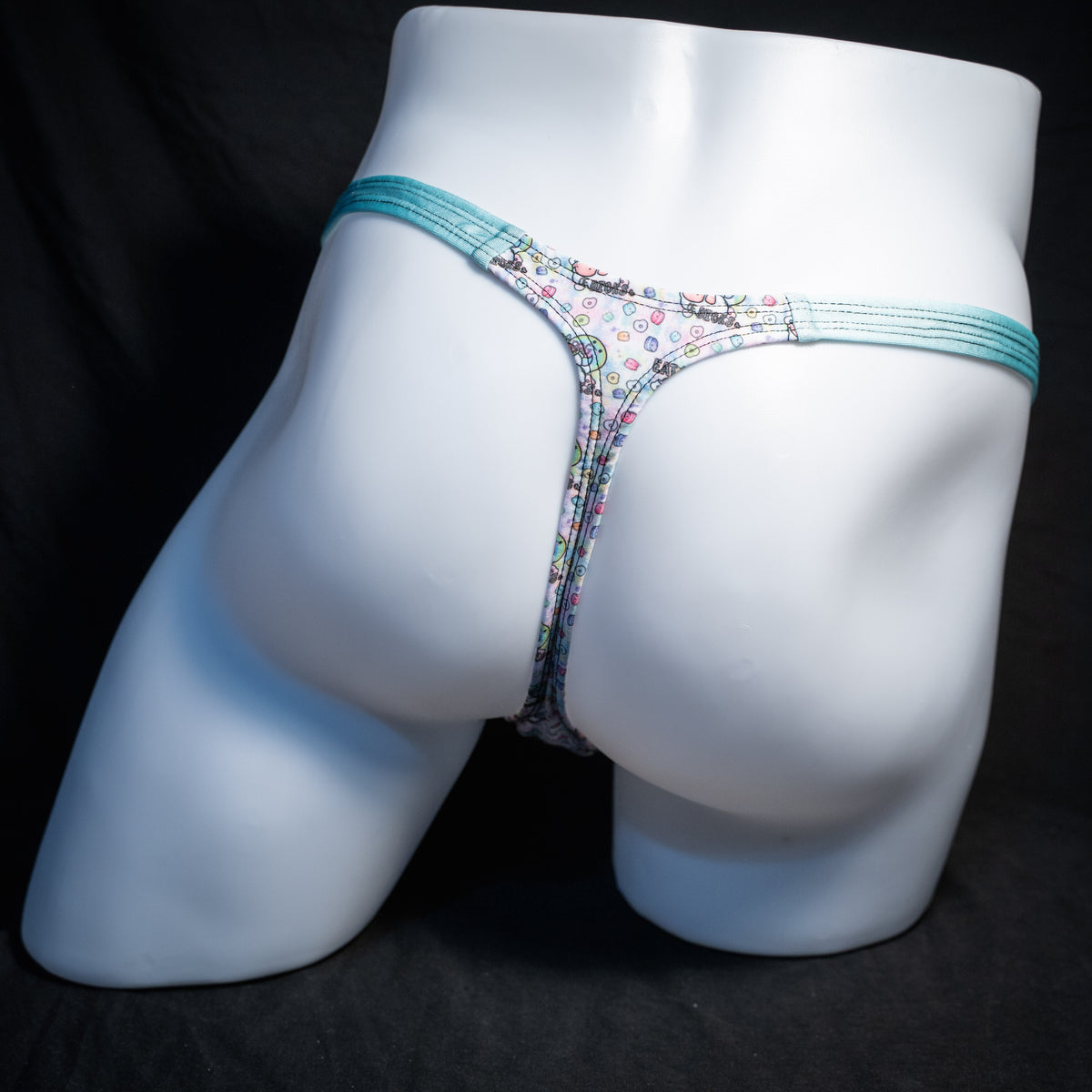 Men's bag of dicks thong underwear, classic cut, rear view.