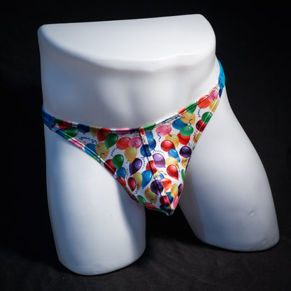 Men's colorful balloons thong underwear, classic cut, front view.