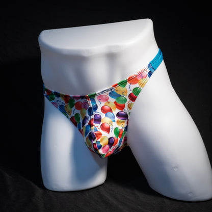 Men's colorful balloons thong underwear, classic cut, front view.