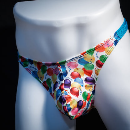 Men's colorful balloons thong underwear, classic cut, front view.