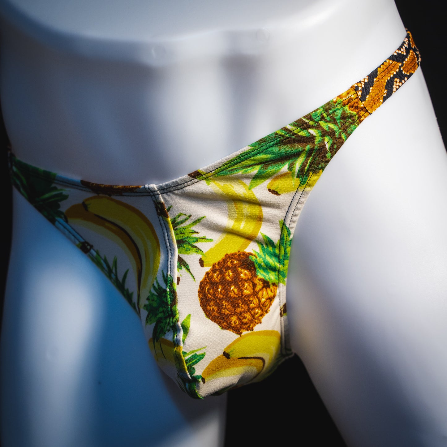 Men's banana hammock with rattlesnake straps thong underwear, classic cut, angled front view.