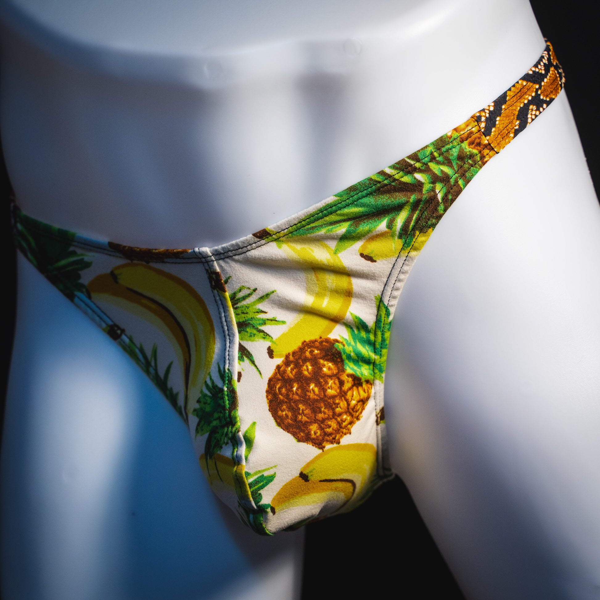 Men's banana hammock with rattlesnake straps thong underwear, classic cut, angled front view.