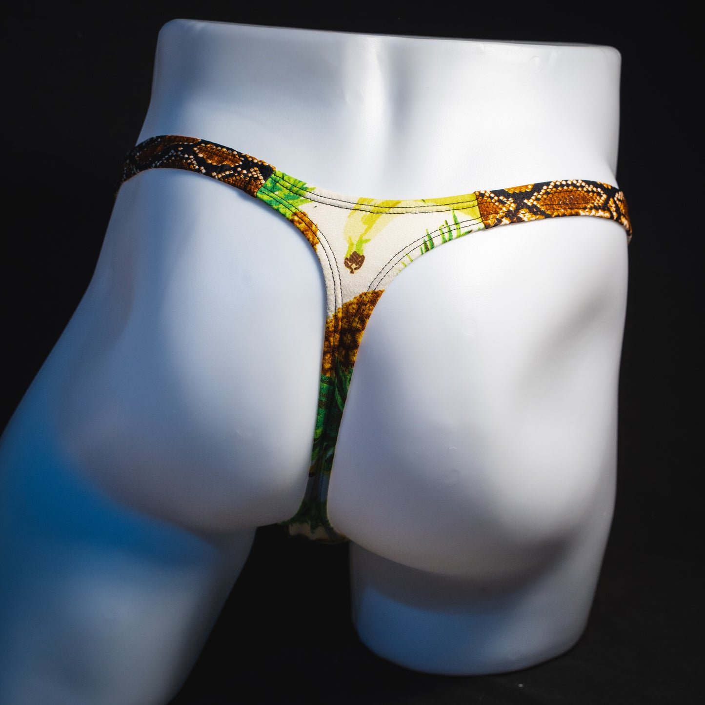 Men's banana hammock with rattlesnake straps thong underwear, classic cut, full rear view.