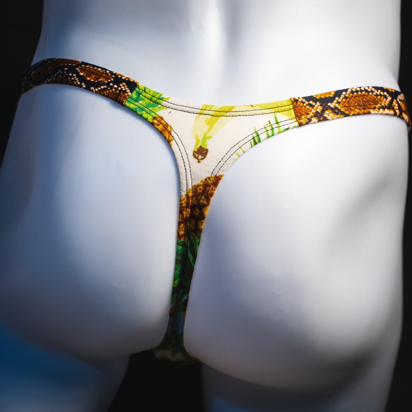 Men's banana hammock with rattlesnake straps thong underwear, classic cut, rear view.