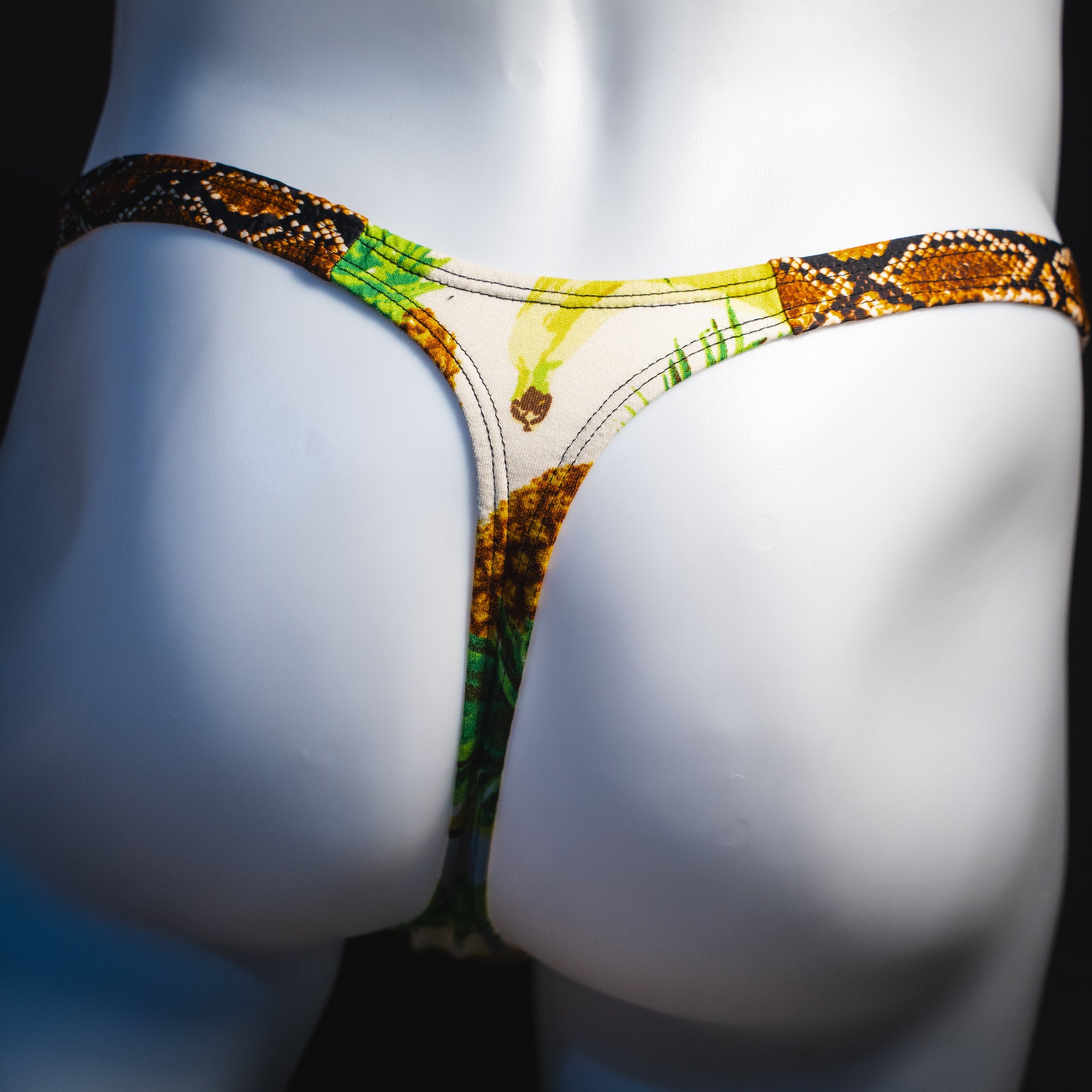 Men's banana hammock with rattlesnake straps thong underwear, classic cut, rear view.