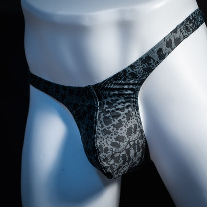Men's black and grey abstract print thong underwear, slim cut, front view.