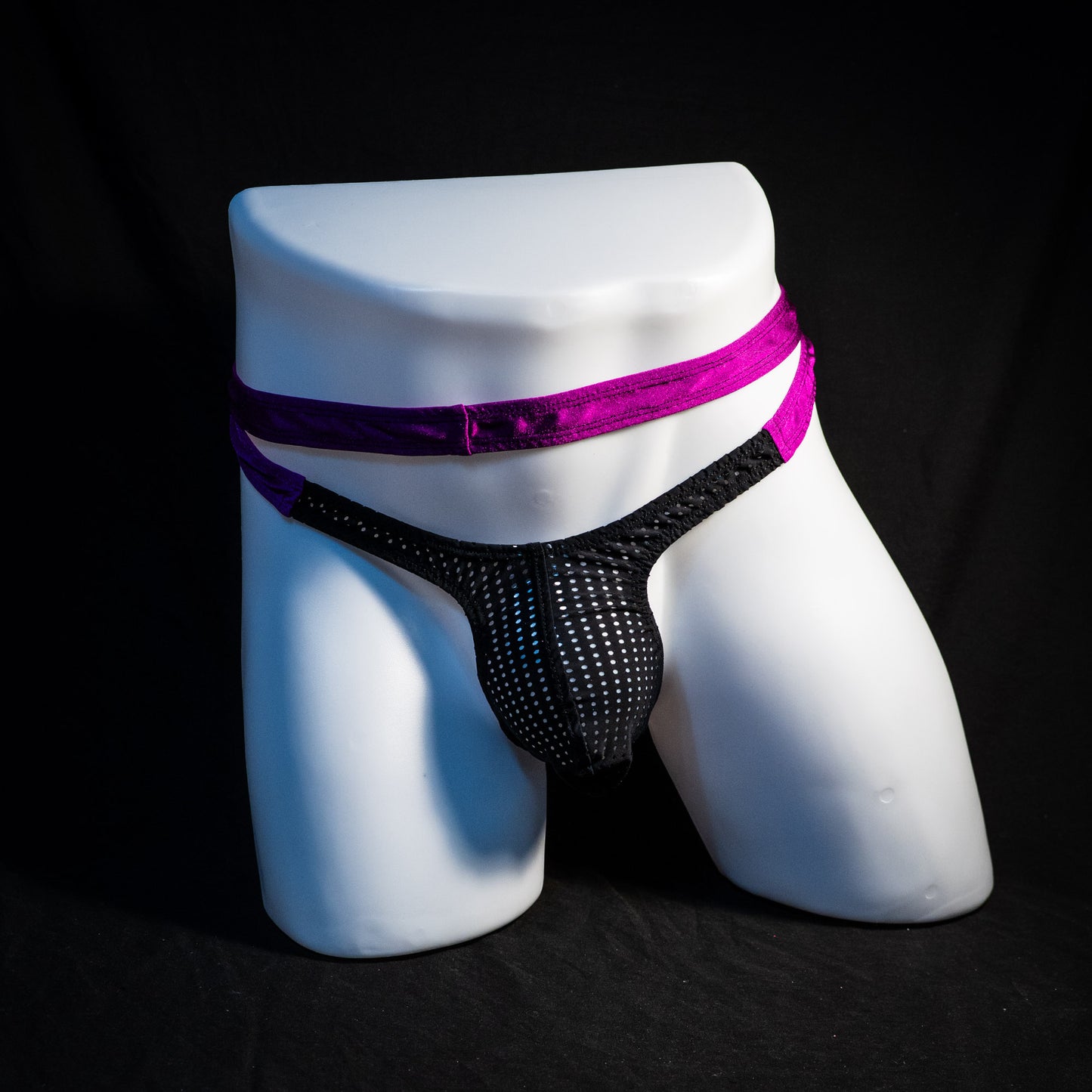 Men's double strap black mesh with purple straps, thong underwear, tower cut, full front view.