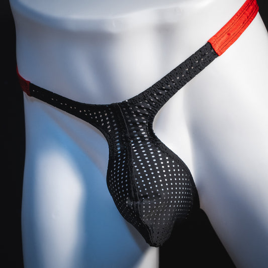 Men's black and red mesh thong underwear, classic cut, angled front view.