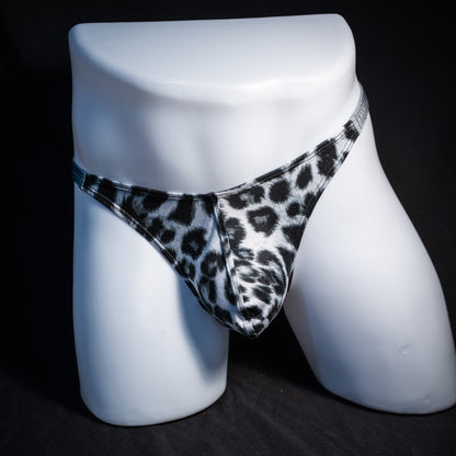 Men's black and white leopard thong underwear, classic cut, front view.