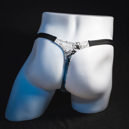 Men's black and white snakeskin thong underwear, classic cut, full rear view.