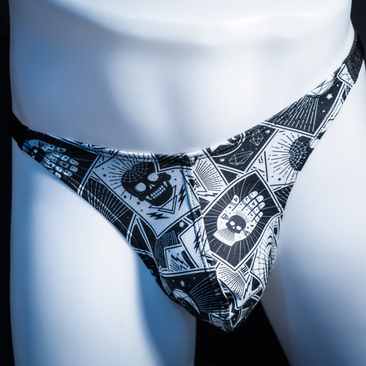 Men's black and white tarot thong underwear, classic cut, front view.