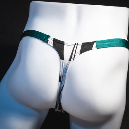 Men's black and white geometric thong underwear with green side straps, classic cut, Rear view