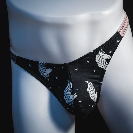 Men's black and white unicorn thong underwear, classic cut, front view.