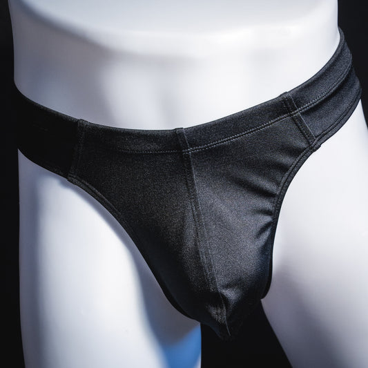 Men's black brief cut thong underwear, front view.