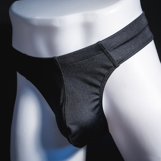 Men's black brief cut thong underwear, front angled view.