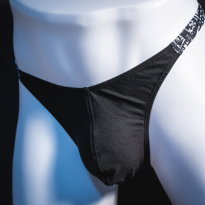 Men's black modal thong underwear, classic cut, front angled view.
