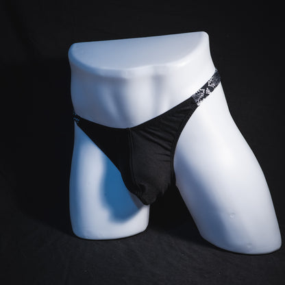 Men's black and white snakeskin thong underwear, classic cut, Full angled front view