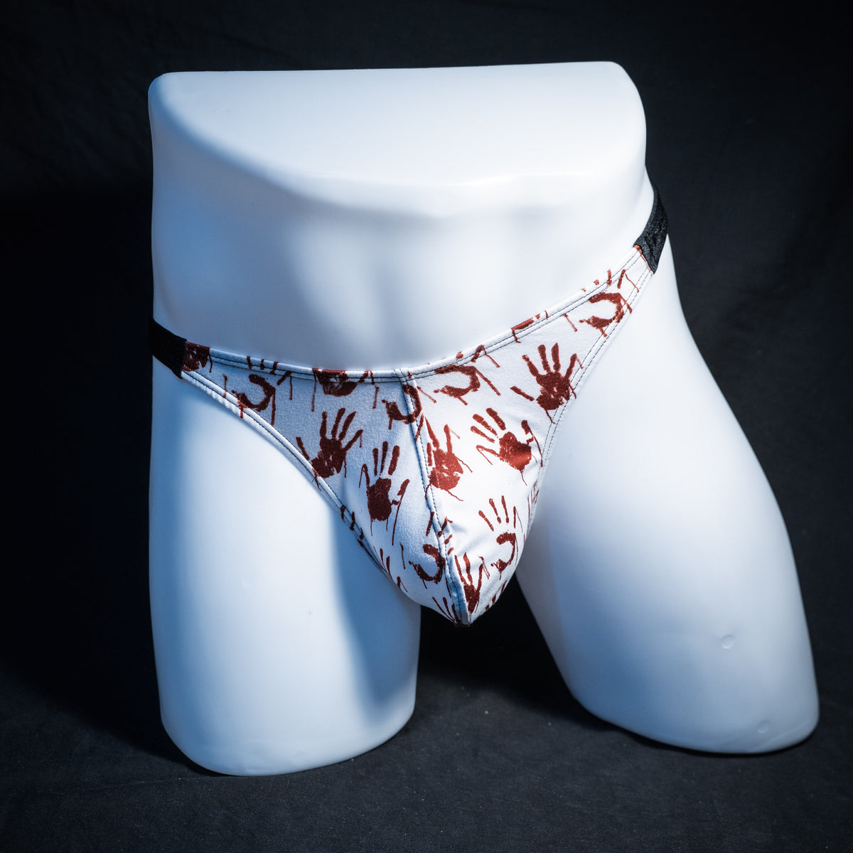 Men's bloody handprint thong underwear, classic cut, front view.