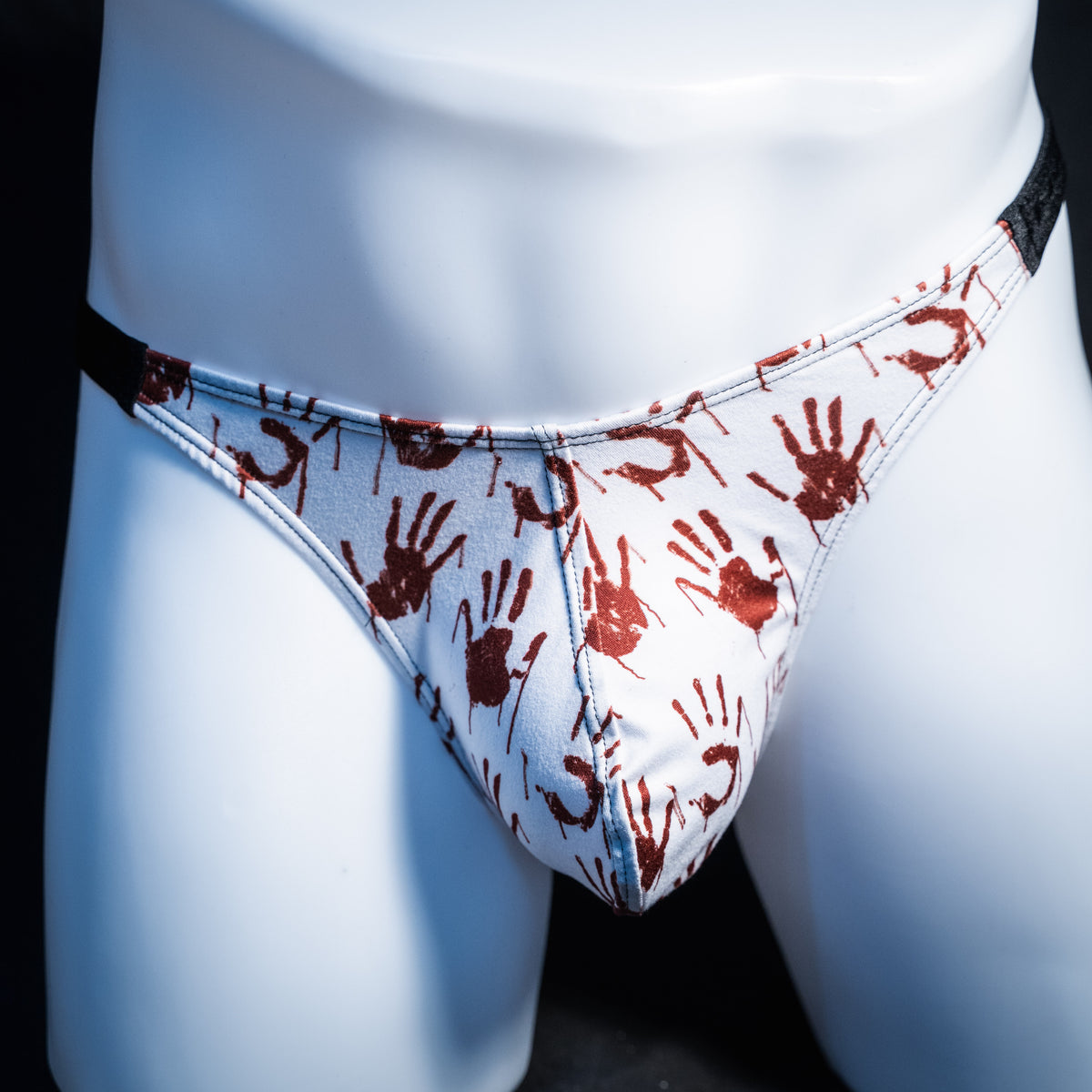 Men's bloody handprint thong underwear, classic cut, front view.