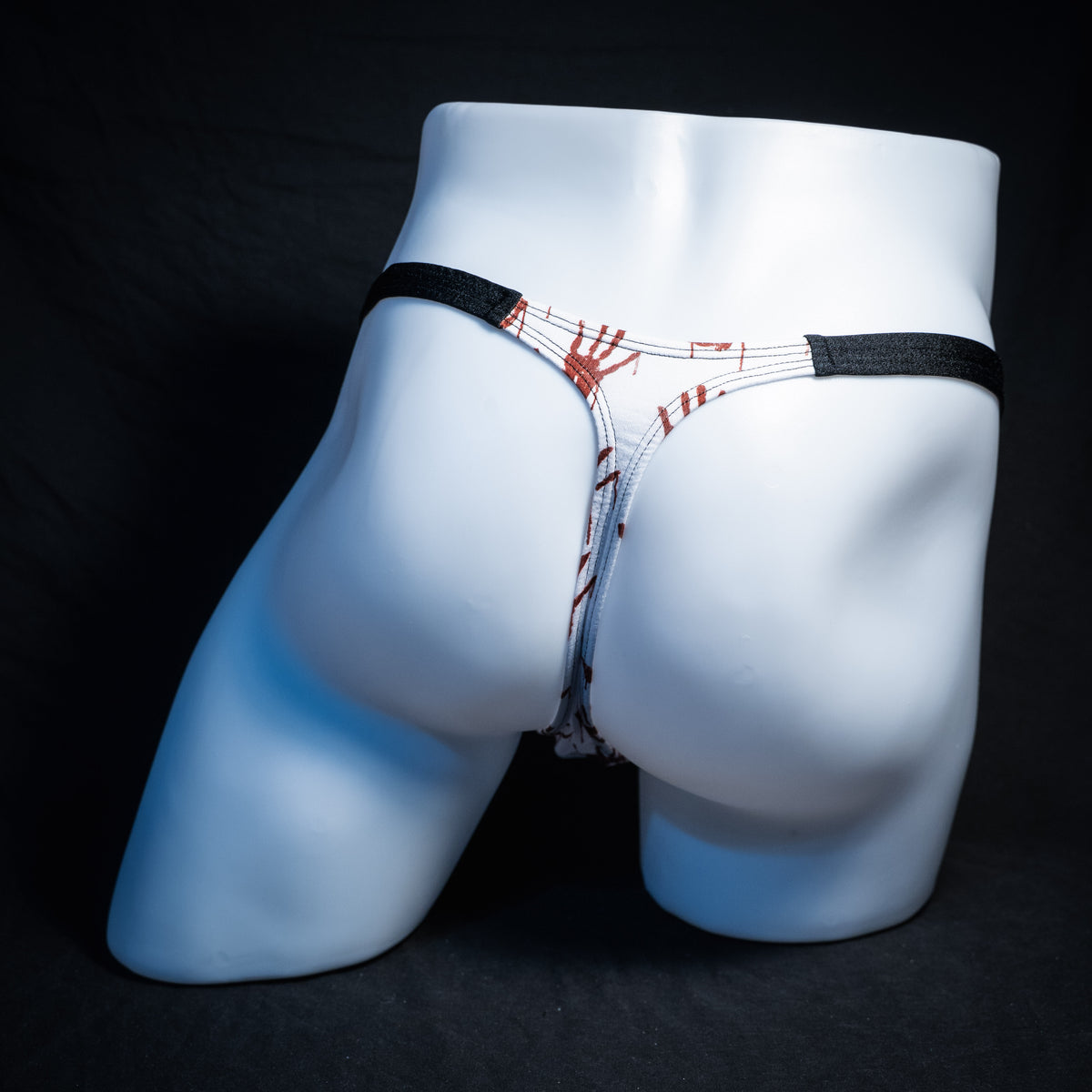 Men's bloody handprint thong underwear, classic cut, rear view.