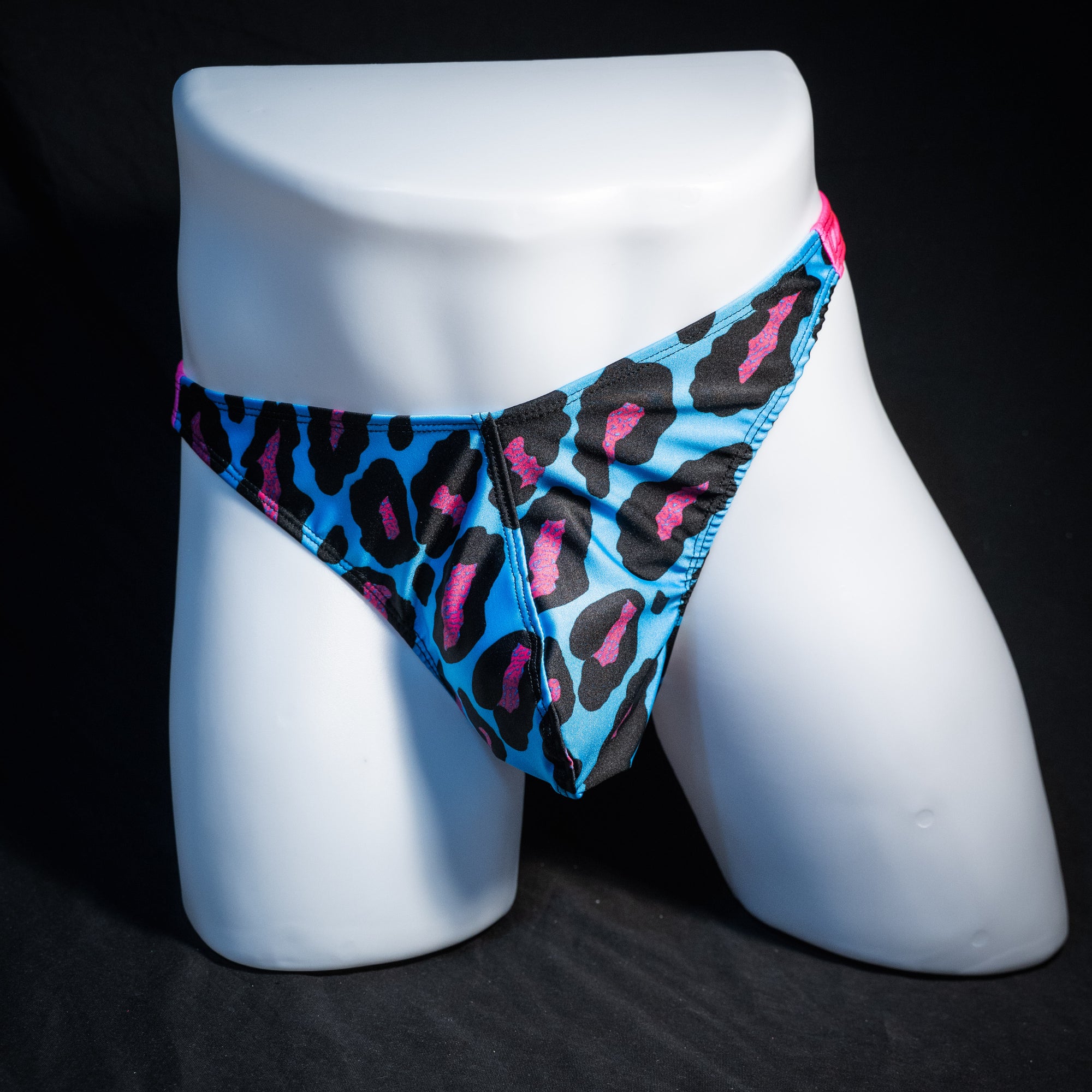 Men's blue and pint cheetah print thong underwear, full thong front, front view.