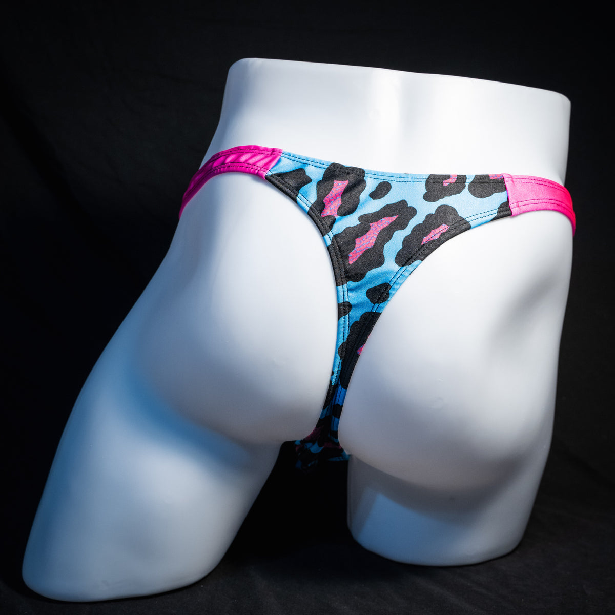 Men's blue and pint cheetah print thong underwear, full thong front, rear view.