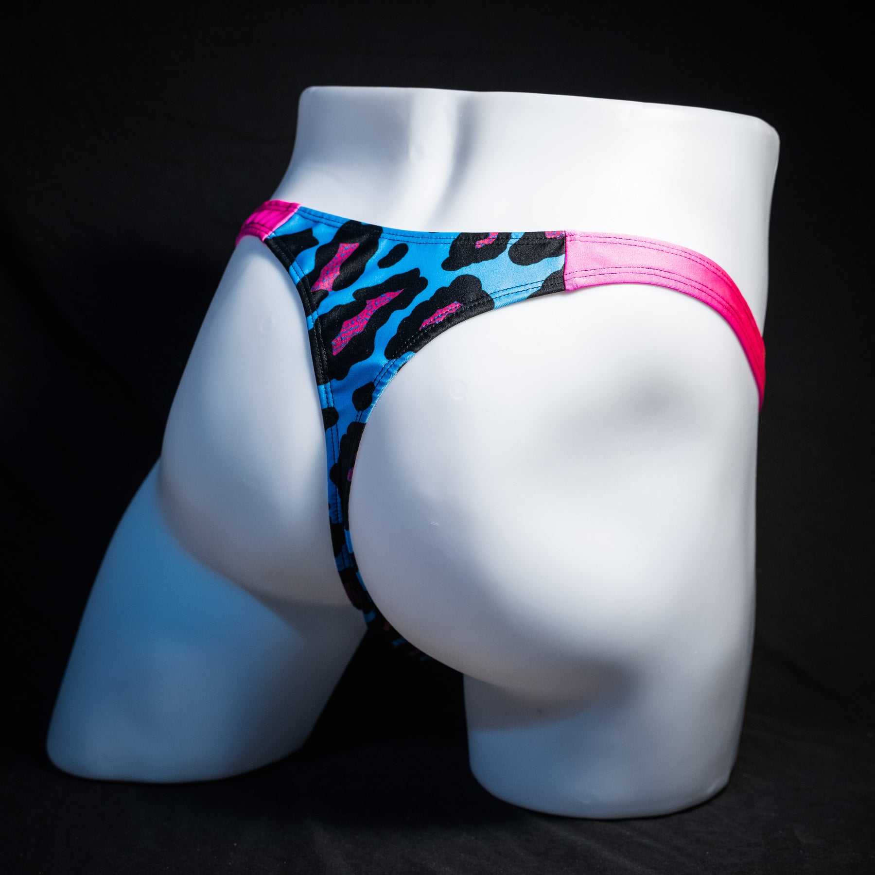 Men's blue and pint cheetah print thong underwear, full thong front, rear view.