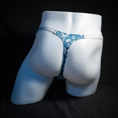 Men's blue and white floral thong underwear, classic cut, rear  view.