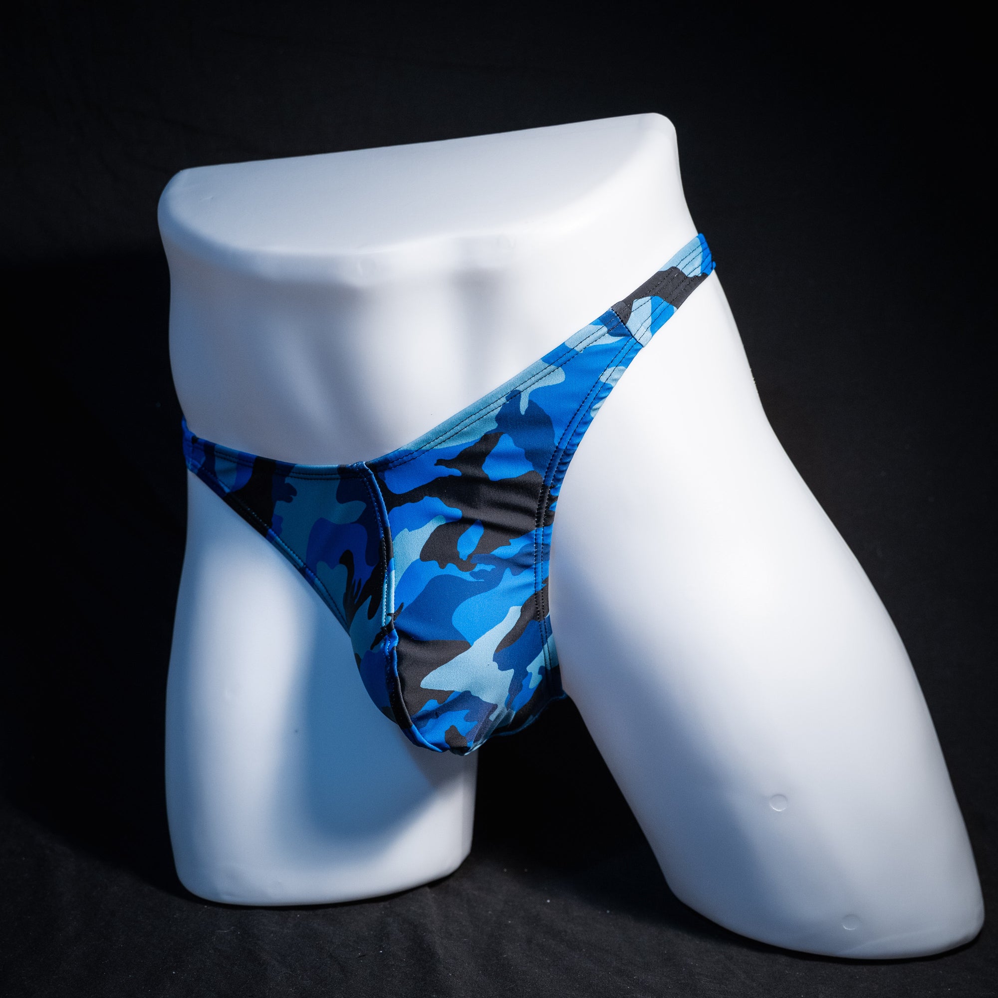 Men's ocean blue camouflage thong underwear, classic cut, front view.