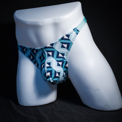 Men's blue geometric thong underwear, classic cut, front view.