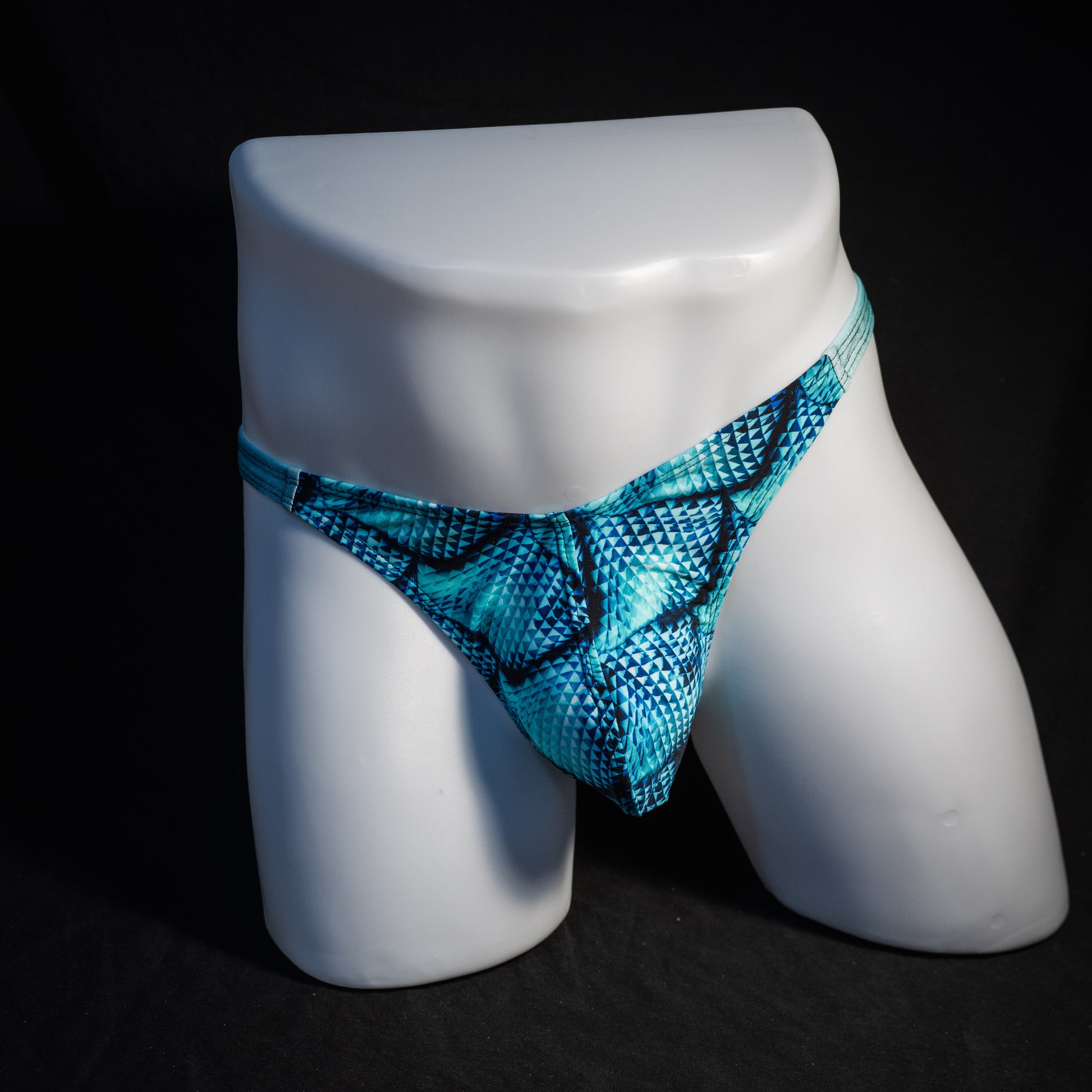 Men's blue merman thong underwear, classic cut, front view.