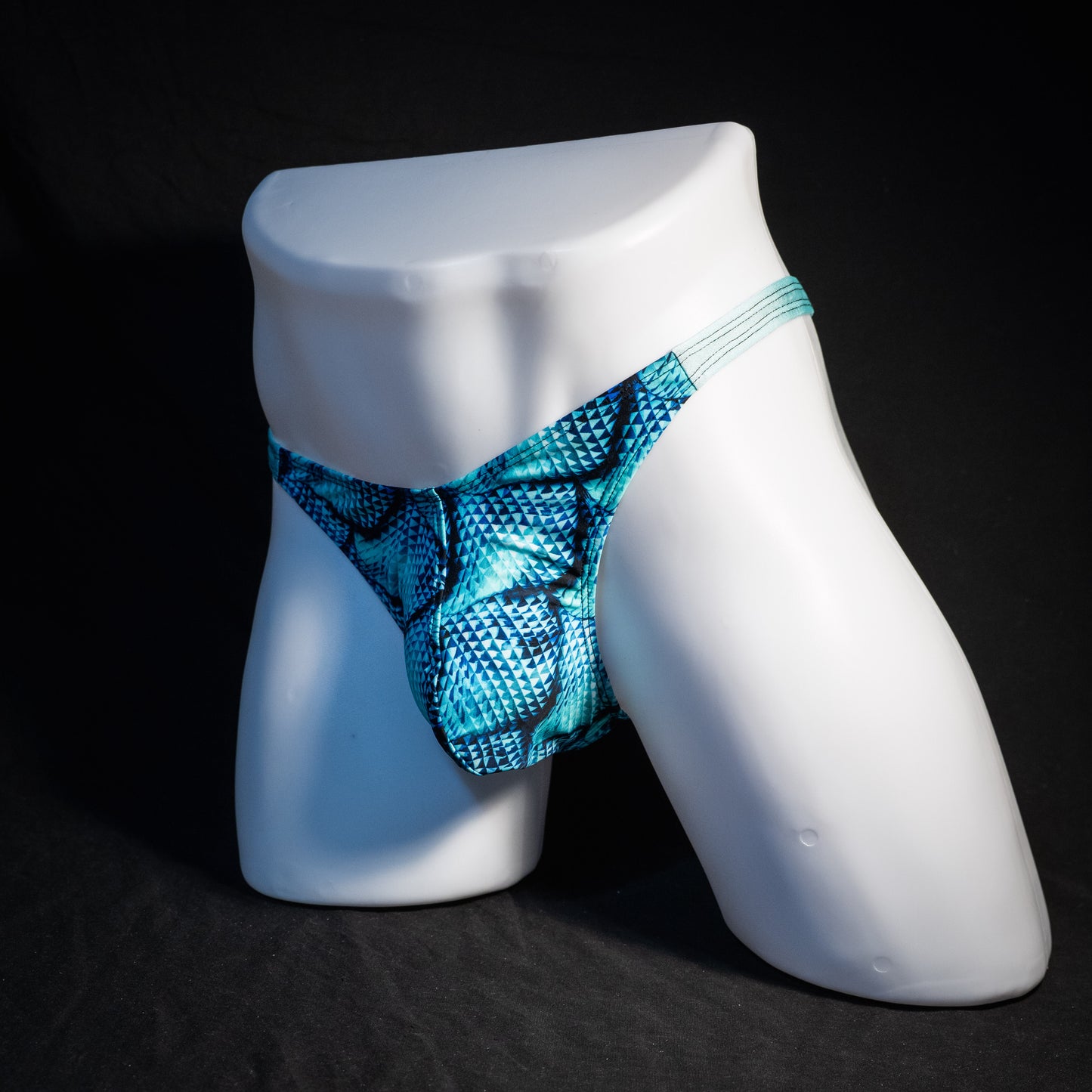 Men's blue merman thong underwear, classic cut, front view.