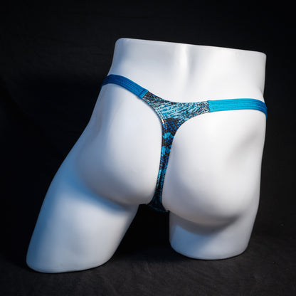 Men's blue metallic snakeskin thong underwear, classic cut, rear view.