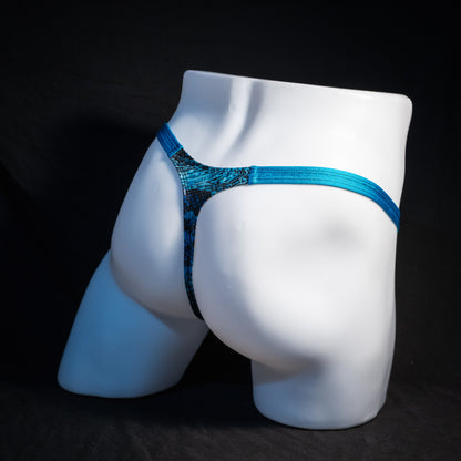 Men's blue metallic snakeskin thong underwear, classic cut, rear view.