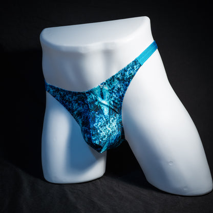 Men's blue ocean thong underwear, classic cut, front view.