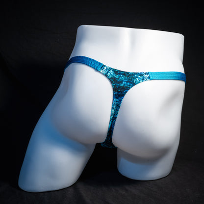 Men's blue ocean thong underwear, classic cut, rear view.