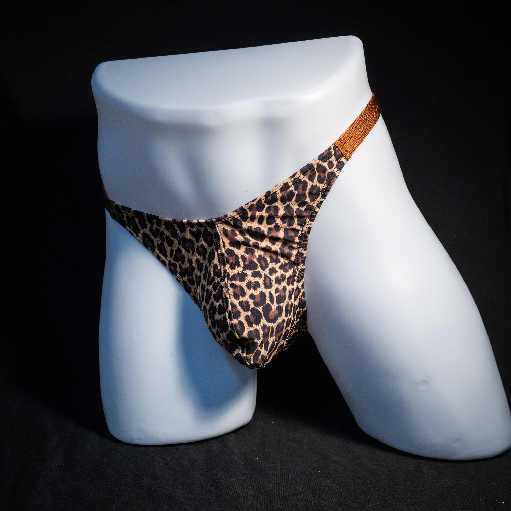 Men's leopard print thong underwear, classic cut, front view.
