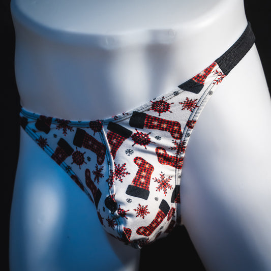 Men's Christmas stockings thong underwear, classic cut, front angled view.
